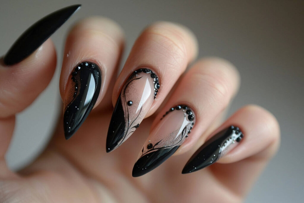 black acrylic nails featuring strategic cutouts